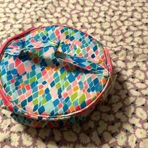 Large round cosmetic bag. Brand new with tags